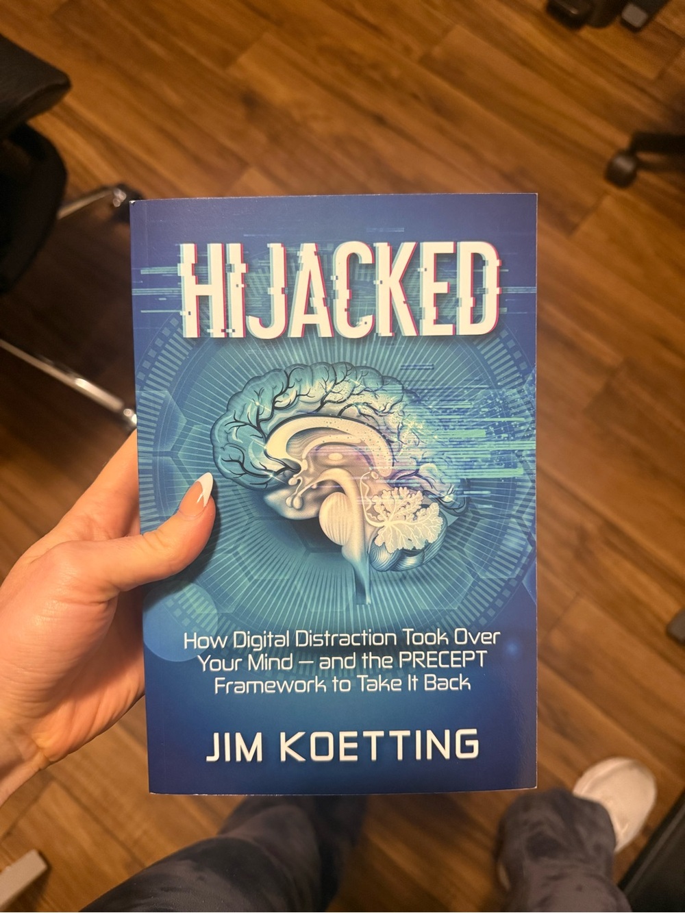 Hijacked by Jim Koetting Blue Cover Paperback Digital Distraction Mindset Book